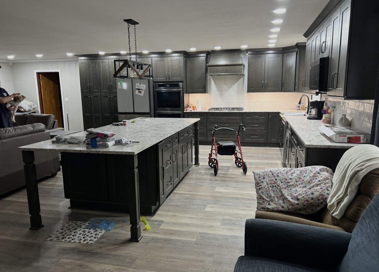 Dark cabinet kitchen renovation with large island